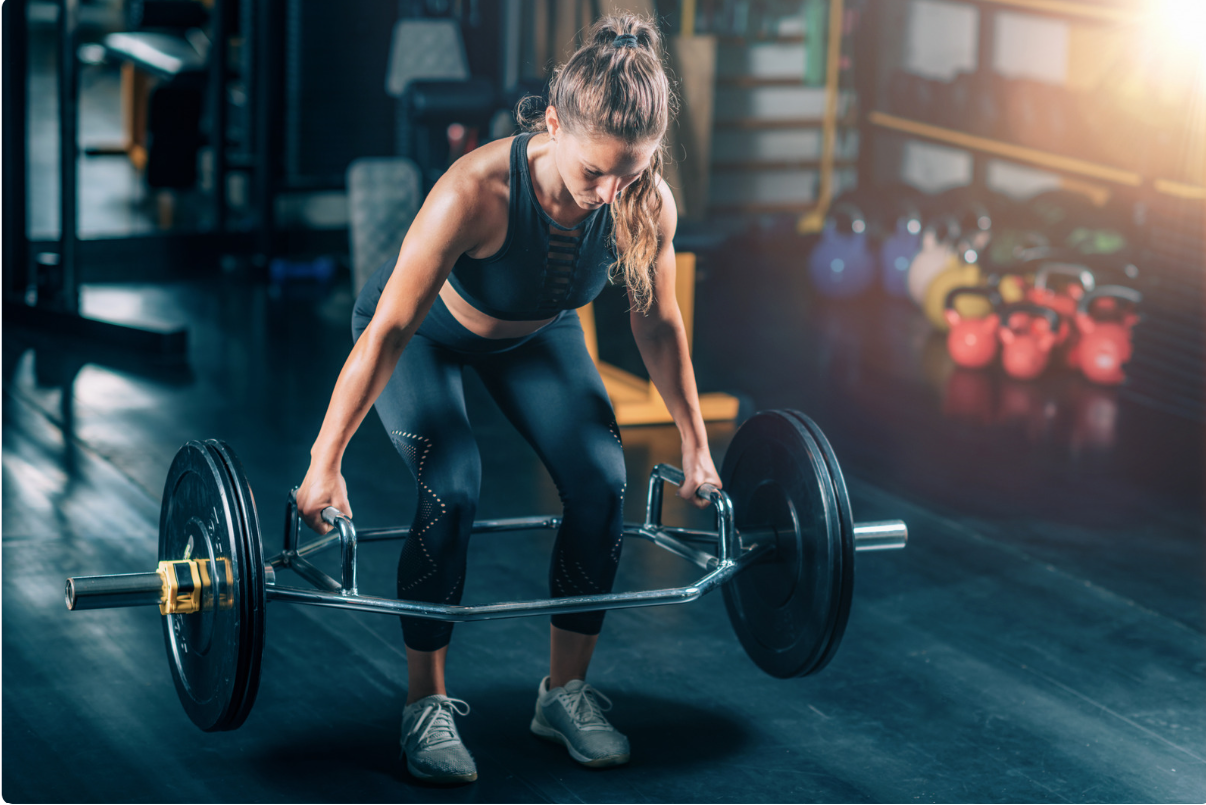 Trap Bar Deadlift Woman using a trap bar to deadlift